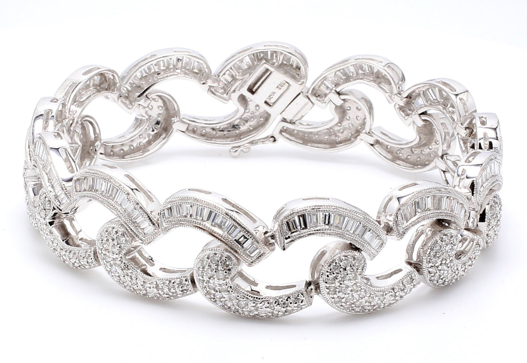 7"" Antique style bracelet in 18K WG with baguette & round diamonds. D4.50ct.t.w.