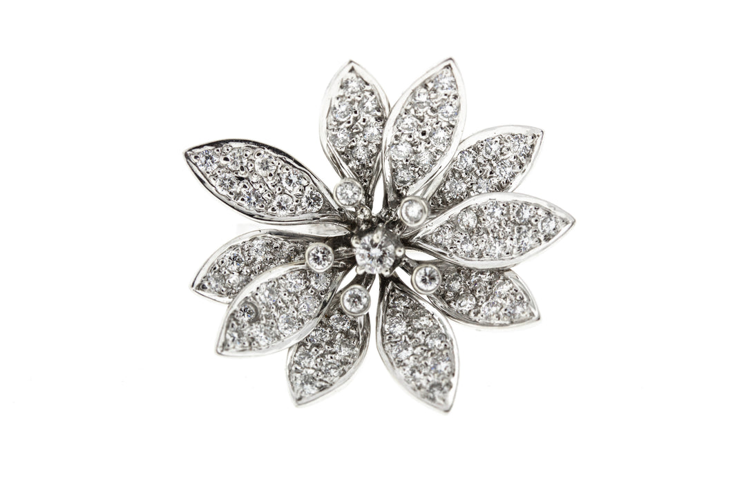 Flower design ring with round diamonds.  D1.11ctt.w.  Size 6.75