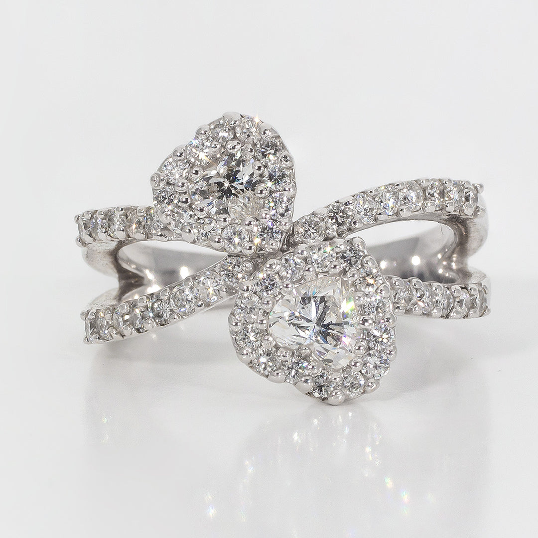 Ribbon style halo ring with round & heart diamond. D1.06ct.t.w. Size 6.5