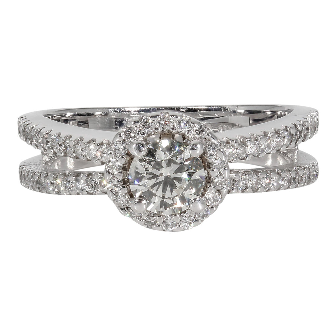 Halo curved split-shank ring with french pave set rounds and a 6-prong set round diamond center stone. D1.00ct.t.w. (Center 0.53ct.)