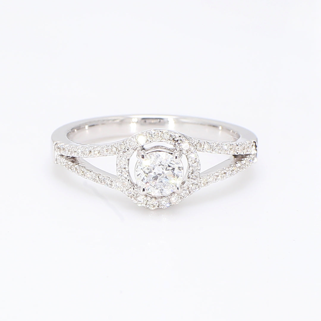 Halo split-shank ring in 18K WG with round diamonds. D0.65ct.t.w. (Center 0.37ct.)