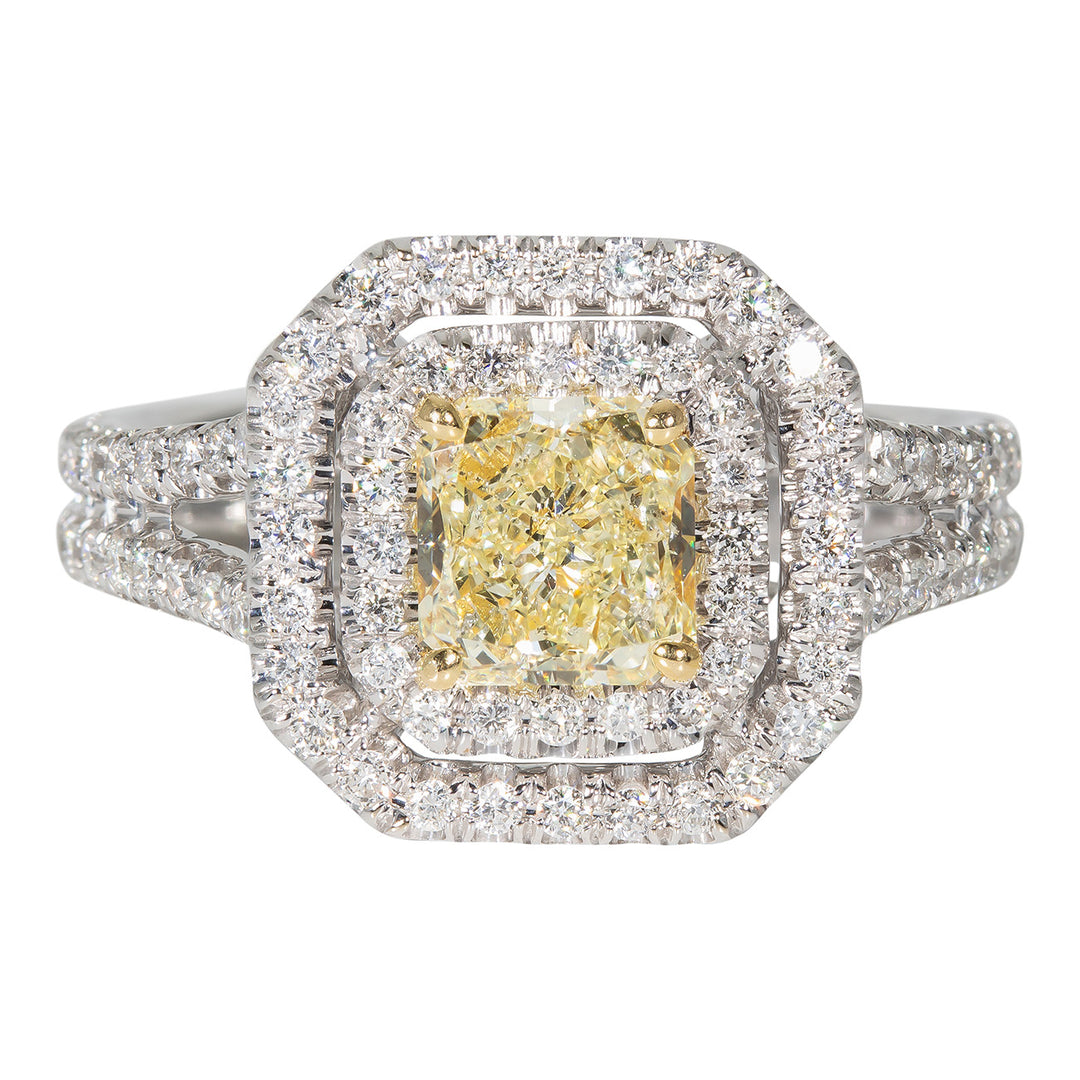 Double halo split shank ring in 18K WG with french pave set rounds and GIA certified FLY/SI2 radiant cut diamond center stone. D1.59ct.t.w. (Center 0.93ct.) Size 6.5