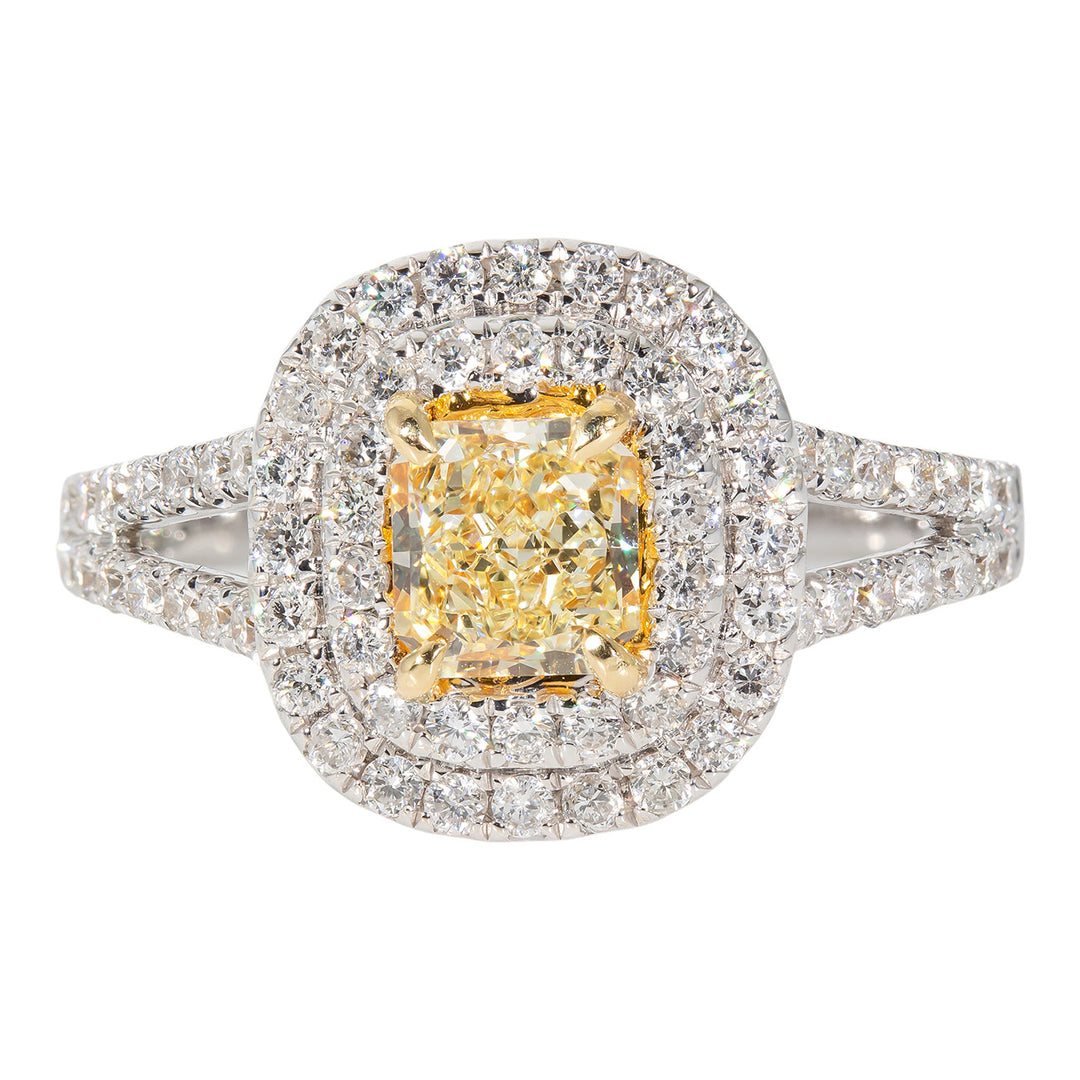 Double halo split shank ring in 18K WG with French pave set rounds around FY radiant cut diamond center stone. D1.25ct.t.w. (Center 0.66ct.) Size 6.5