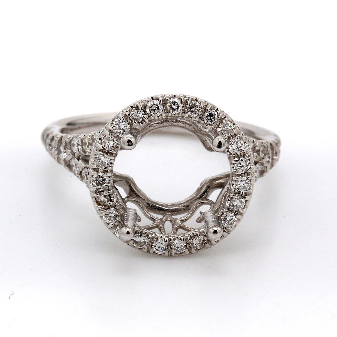 Halo split shank semi mount in18K WG with U-prong set round diamonds. D0.58ct.t.w.