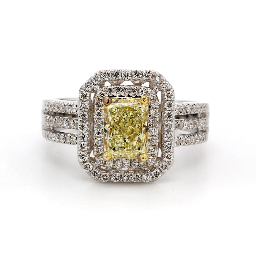 Double halo triple shank ring in 18K WG with 4-prong GIA certified FLY/SI2 radiant center & french pave set round diamonds. D1.54ct.t.w. (Center 1.10ct.) Size 6.5
