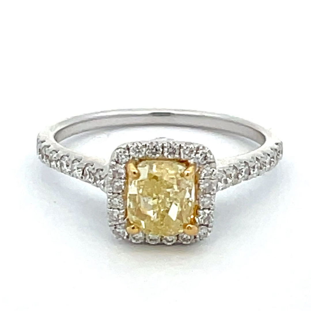 Halo ring in 18K WG with French pave set rounds, design on gallery and 4-prong set cushion cut diamond center. D1.46ct.t.w. (Center - 1.01ct.) Size 6.5