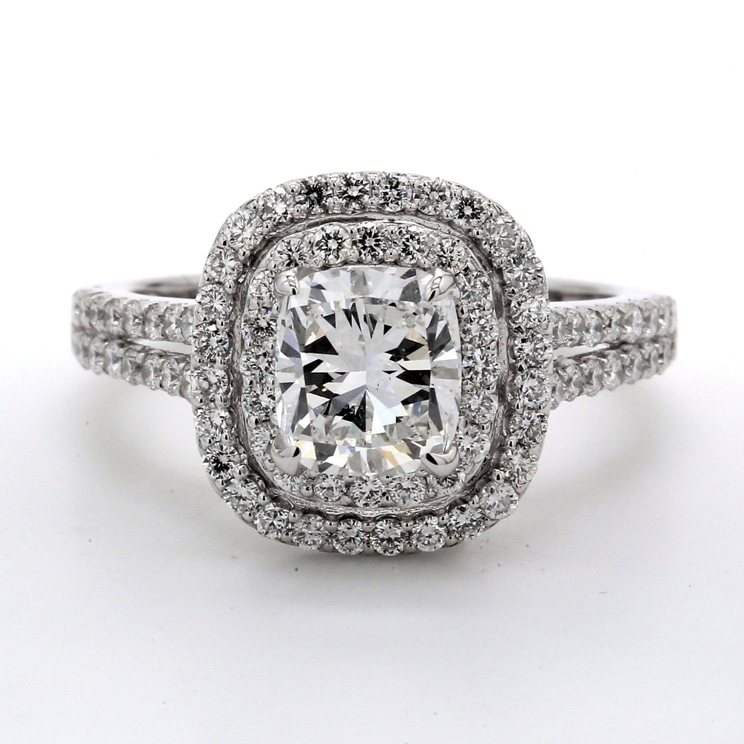 Double halo semi-mount with prong set round diamonds. D0.81ct.t.w. Size 6.75