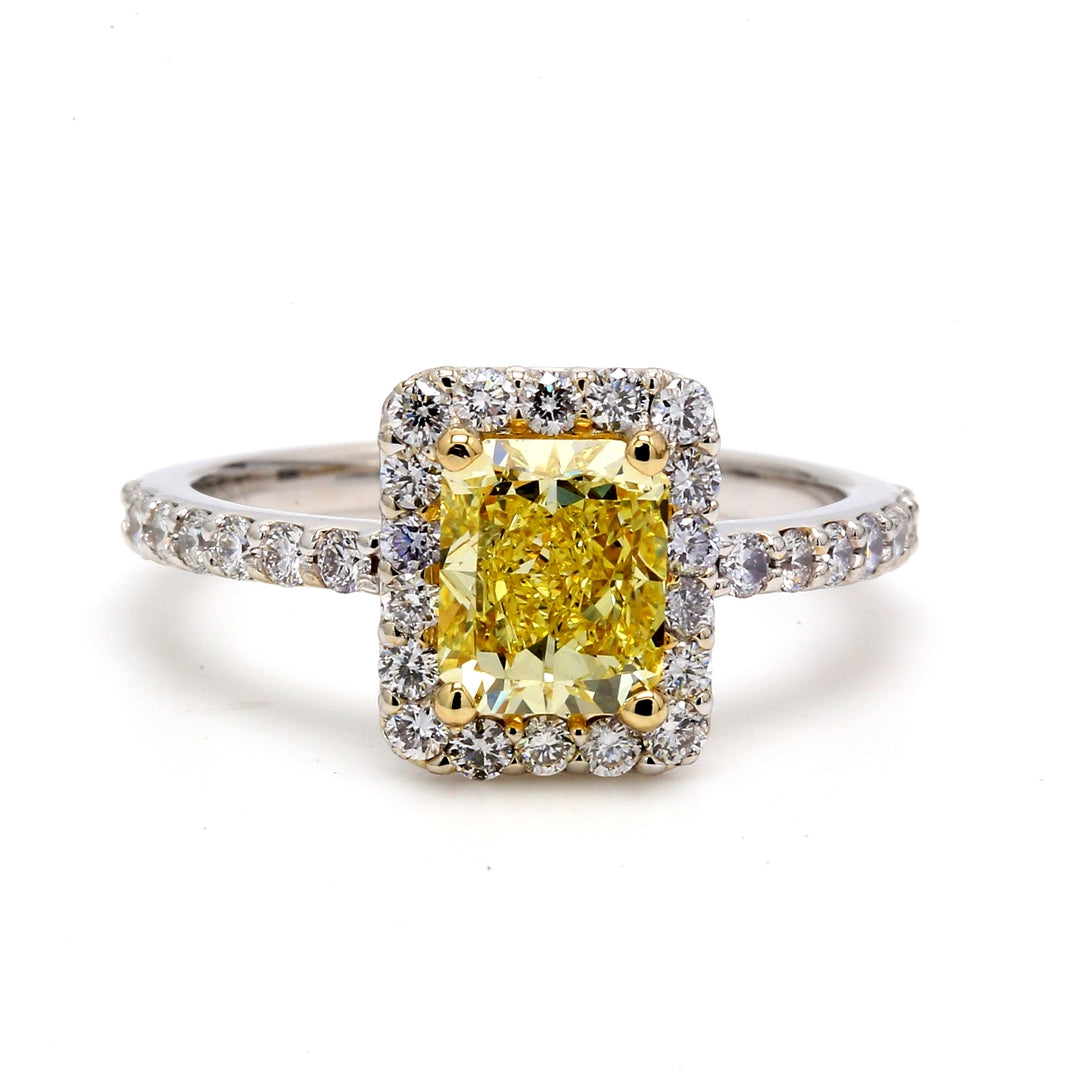 Halo ring with GIA certified FIY/SI1 radiant center & shared prong set round diamonds. D1.91ct.t.w. (Center 1.26ct.)