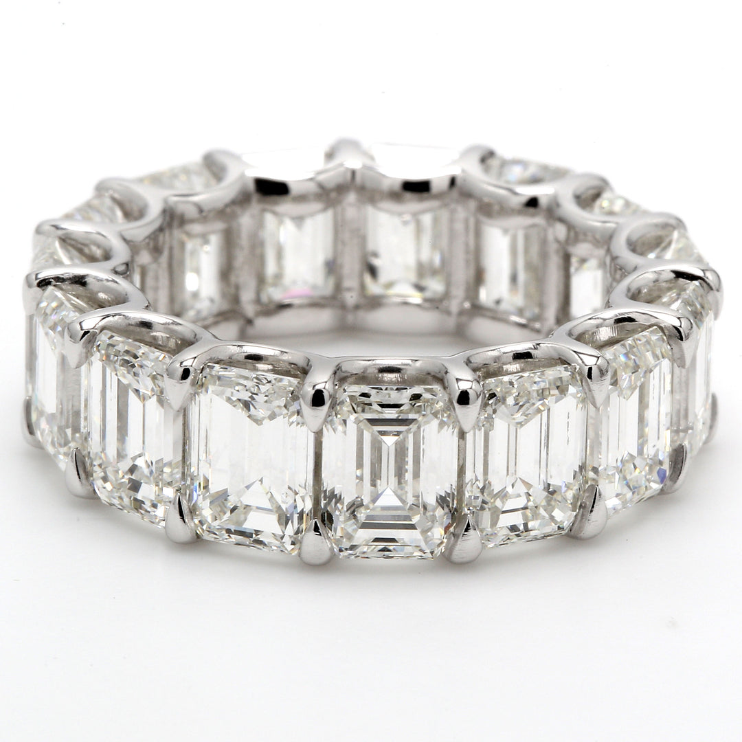 Eternity band in platinum with U-prong set GIA certified H/VVS-VS2 (15) emerald cut diamonds. D13.62ct.t.w. Size 6.25