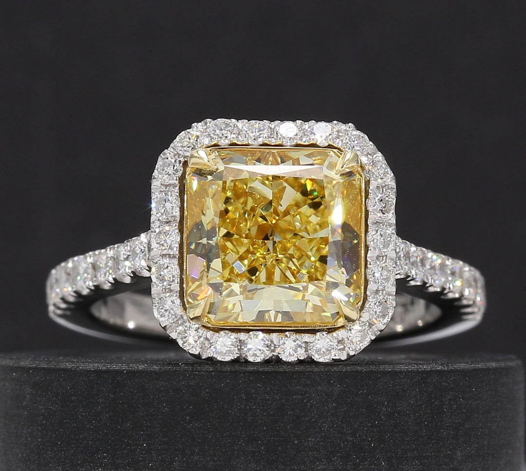 Halo semi-mount in platinum with prong set round diamonds. D0.64ct.t.w.
