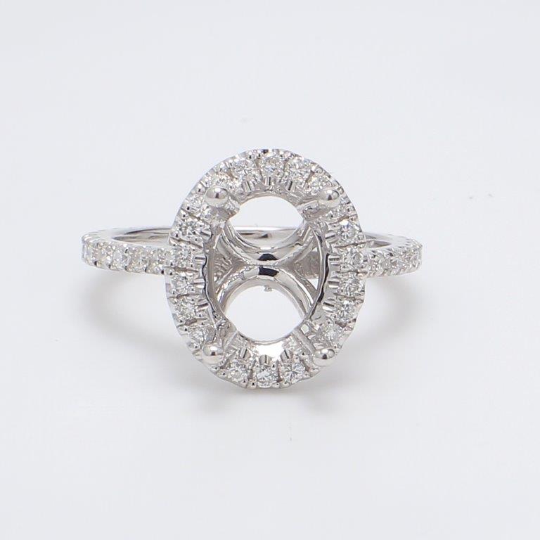 Halo semi-mount with shared prong set round diamonds. D0.52ct.t.w. Size 4.75