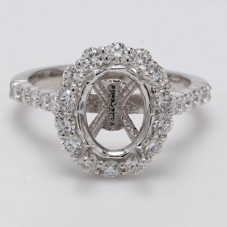 Halo semi-mount with shared prong set round diamonds. D0.99ct.t.w.