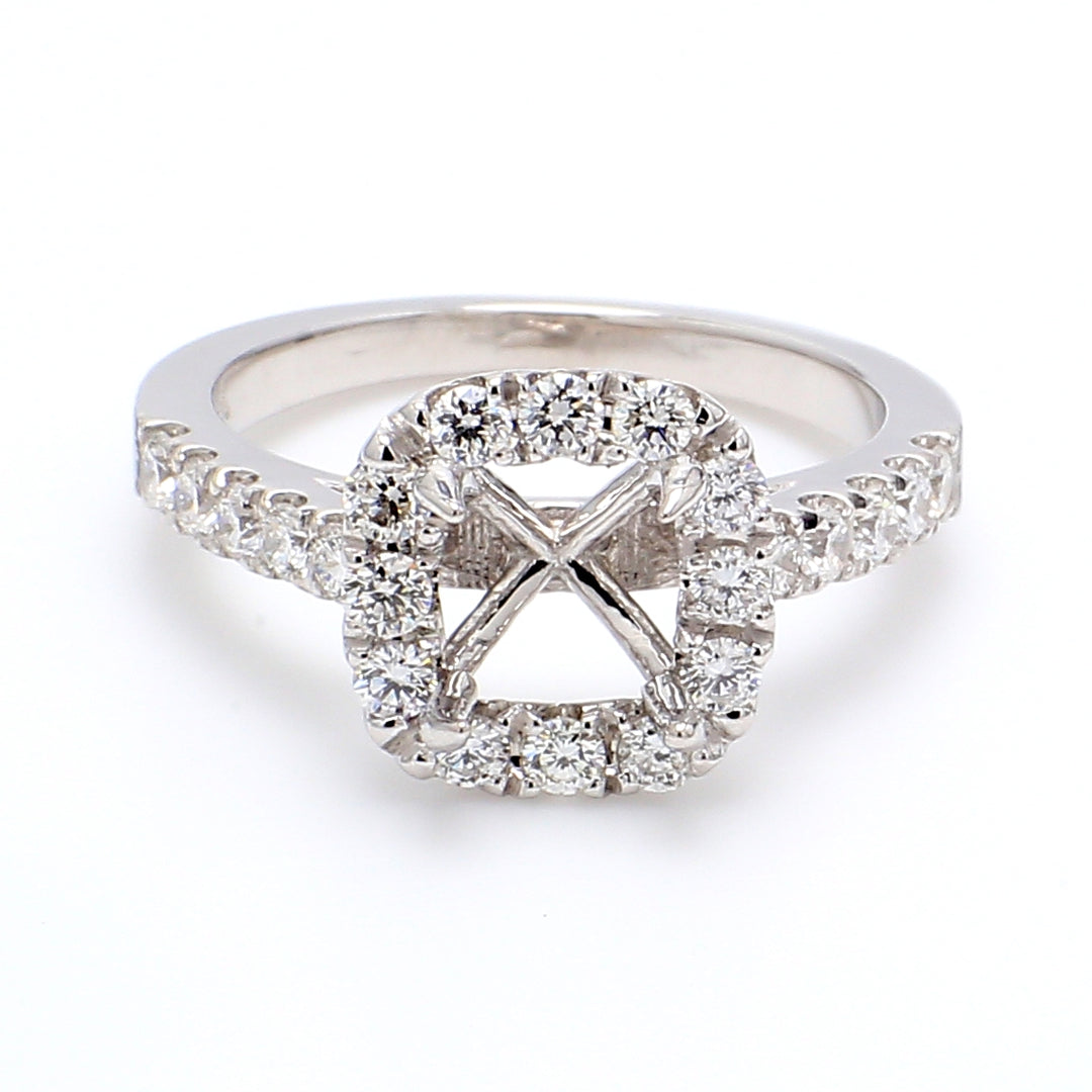 Halo semi-mount with U-prong set round diamonds. D0.62ct.t.w. Size 5.75