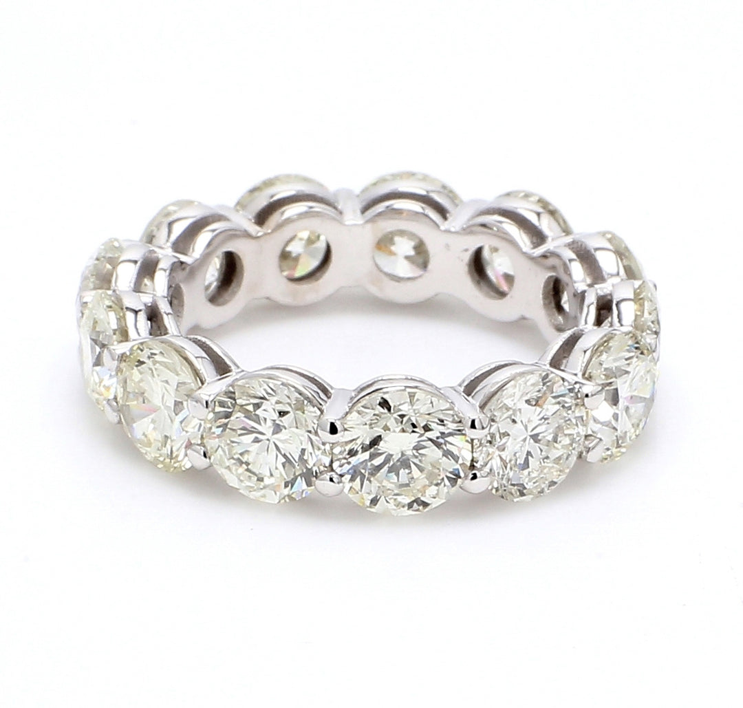 Eternity band with shared prong set round diamonds. D7.76ct.t.w.