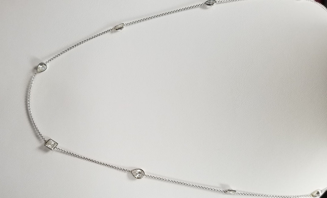 19"" Diamonds by the yard necklace in 18K WG with bezel set princess, pear, & radiant diamonds. D3.56ct.t.w.