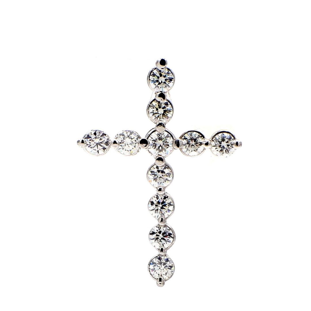 1"" Cross pendant with shared prong set (11) round diamonds. D1.18ct.t.w.
