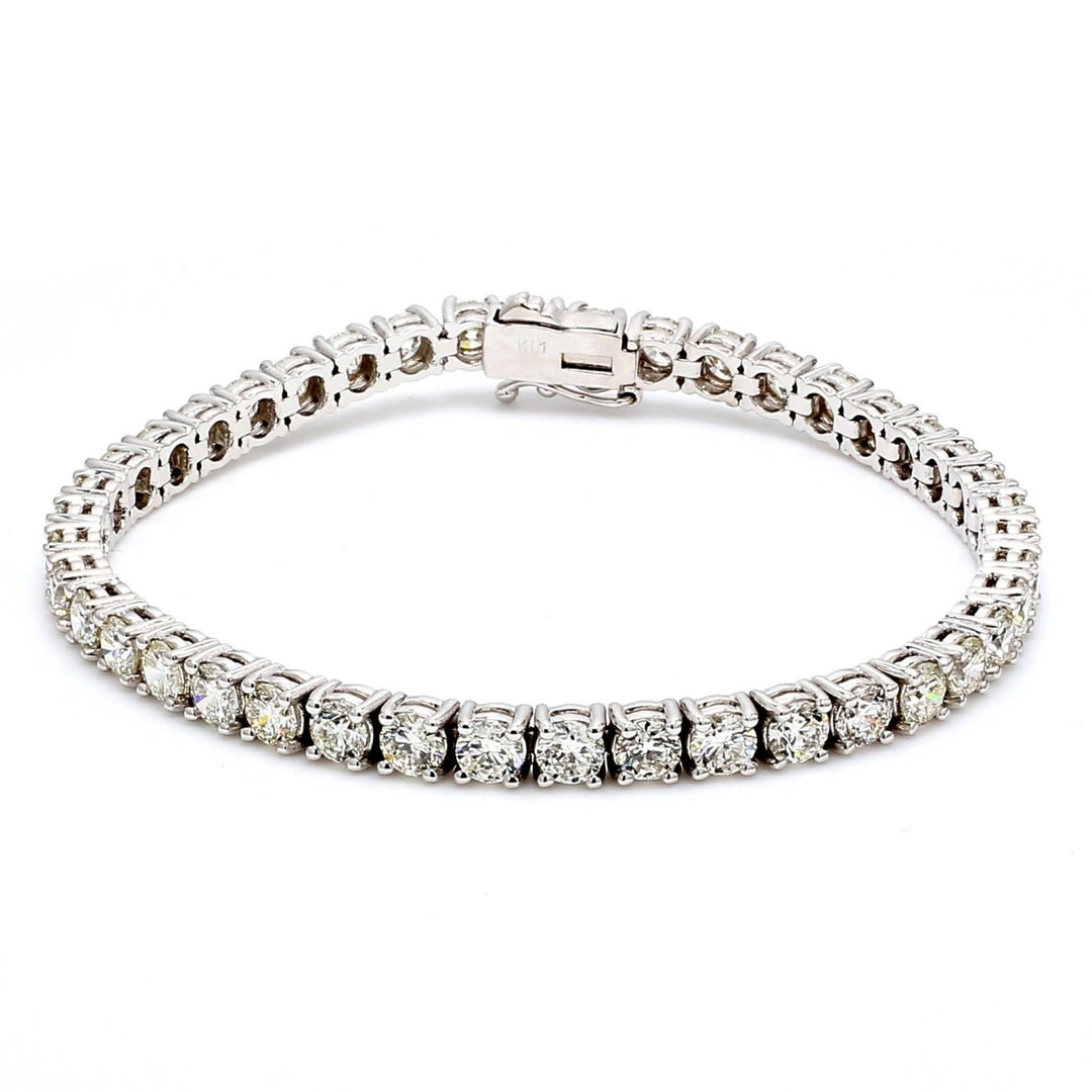 7.25"" Tennis bracelet with 4-prong set round diamonds. D9.79ct.t.w.
