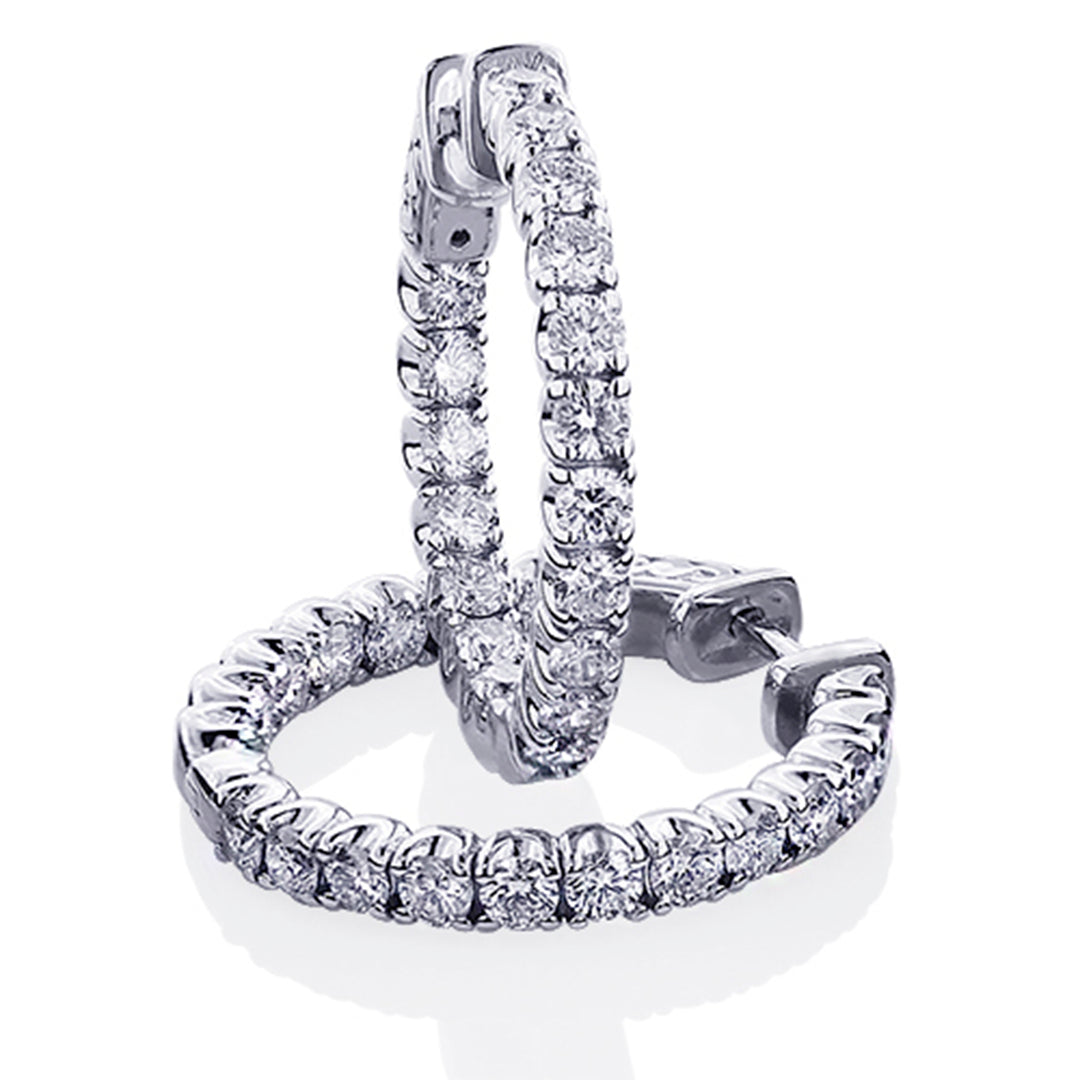 0.75"" Inside out hoop earrings with U-prong set round diamonds & with special spring lock. D1.16ct.t.w.