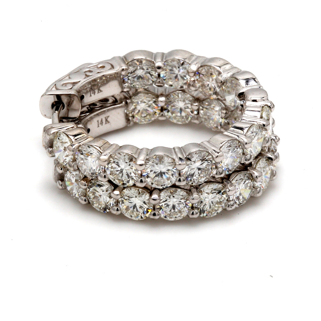 1"" Inside out hoop earrings with shared prong set (24) round diamonds. D4.20ct.t.w.