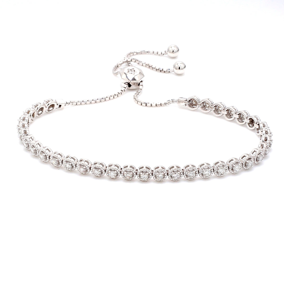 Bolo style adjustable tennis bracelet with 4-prong set (36) round diamonds. D0.92ct.t.w.