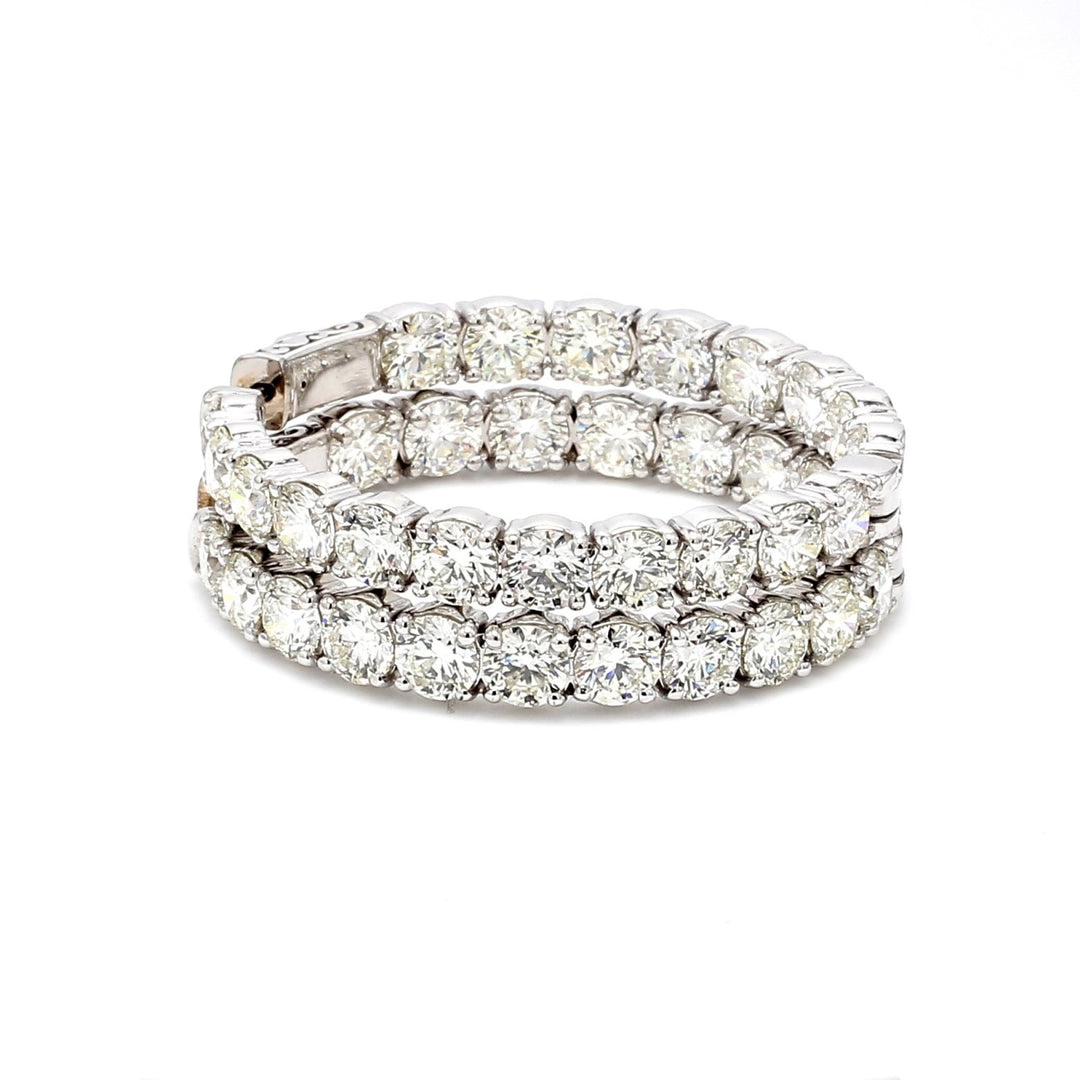 1.5"" Inside out hoop earrings in 18K WG with 4-prong set (38) round diamonds & with special spring lock. D15.35ct.t.w.