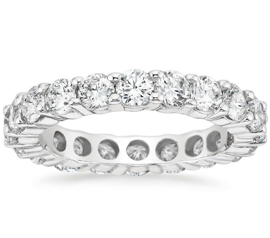 Eternity band with shared prong set (28) round diamonds. D0.55ct.t.w. Size 5