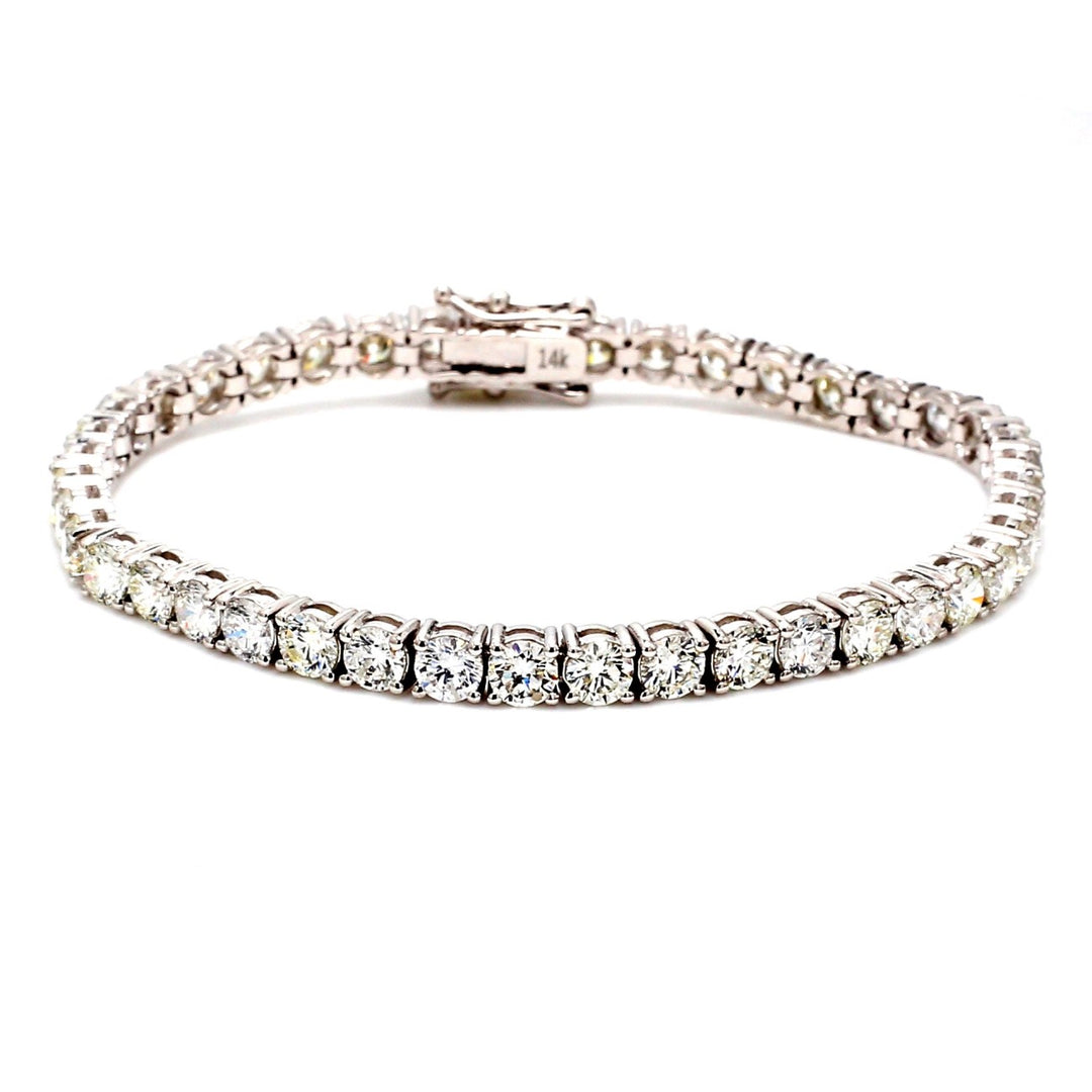 7"" Tennis bracelet with 4-prong set (42) round diamonds. D10.05ct.t.w.