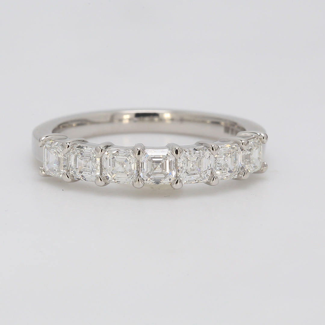 7-stone band in platinum with shared prong basket set asscher cut diamonds. D1.35ct.t.w. Size 7.25