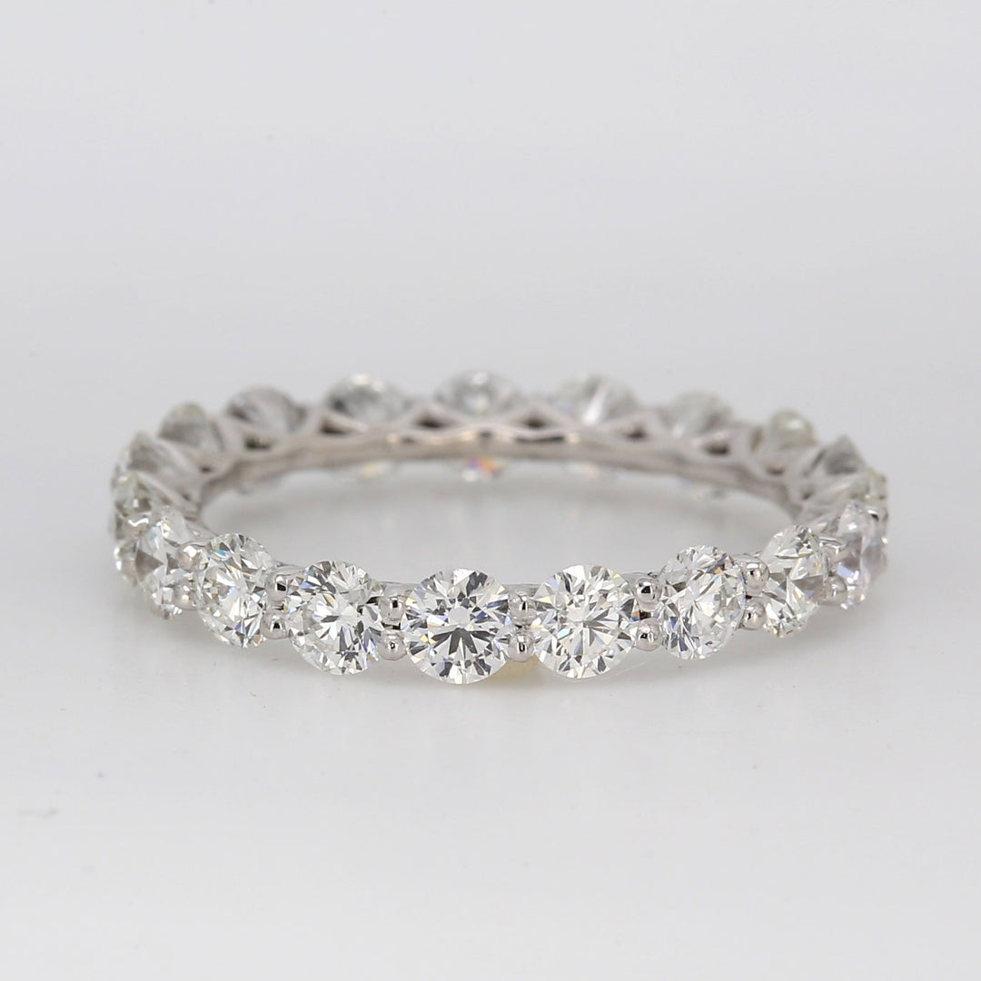 Eternity band in platinum with shared U-prong set round diamonds. D2.30ct.t.w. Size 6