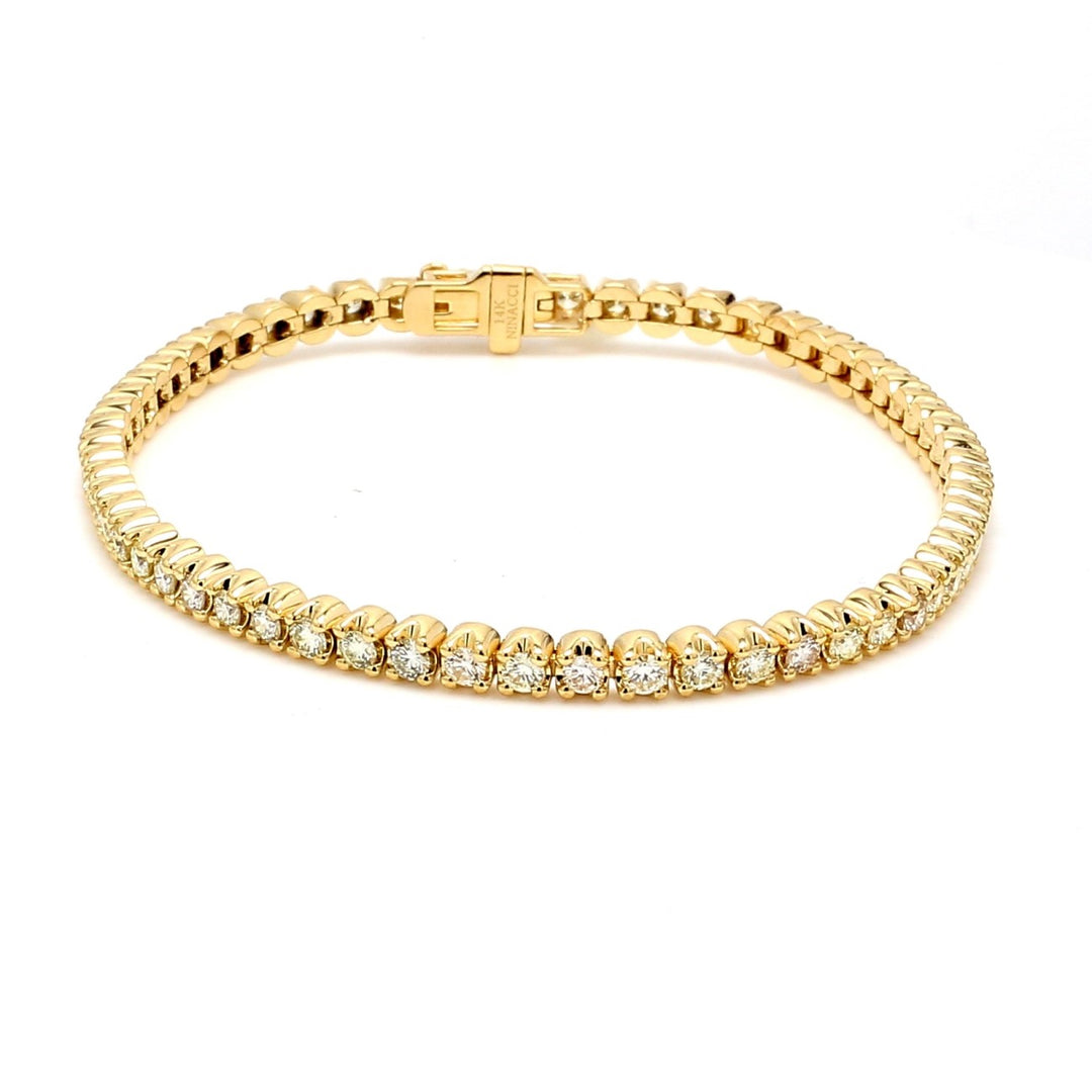 7"" Tennis bracelet in 14K YG with crown head set (60) round diamonds. D2.98ct.t.w.