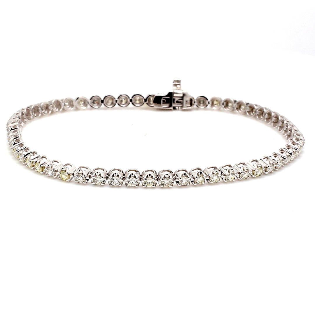 7"" Tennis bracelet with 4-prong crown set (56) round diamonds. D1.88ct.t.w.