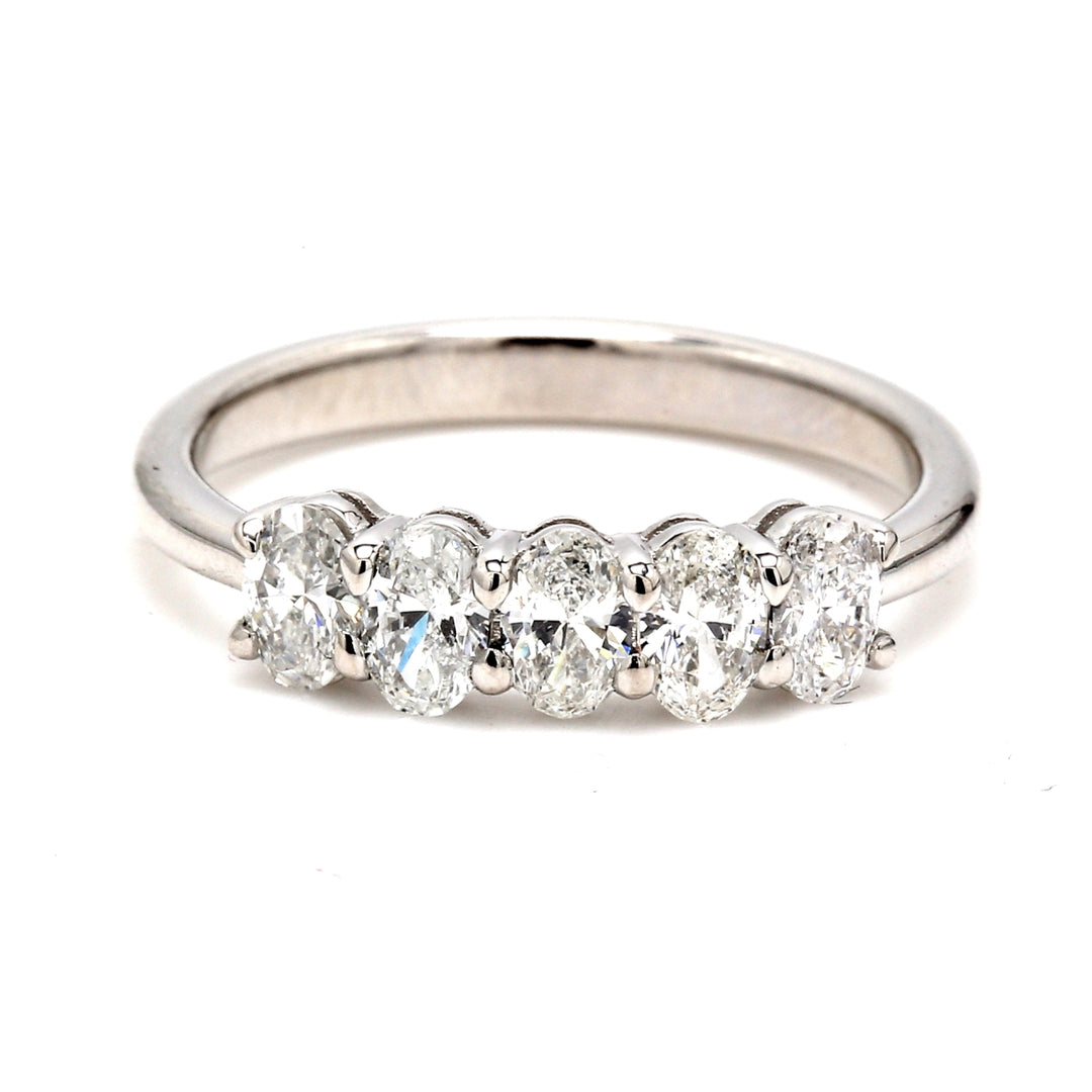 5-stone band in platinum with basket prong set oval diamonds. D0.94ct.t.w. Size 7