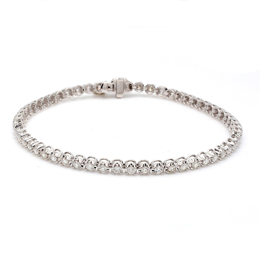 7"" Tennis bracelet with crown head prong set (56) round diamonds. D1.95ct.t.w.