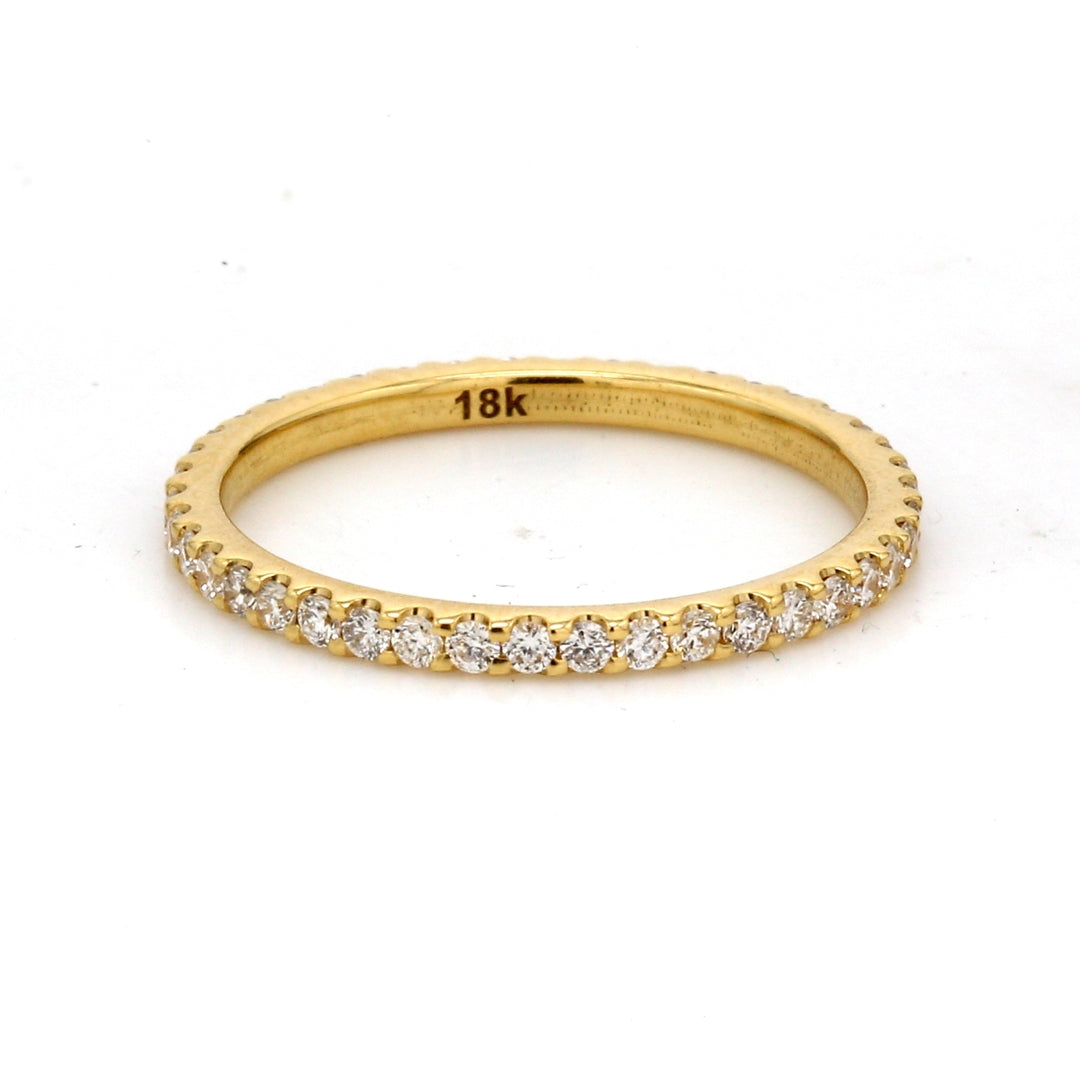 Eternity band in 18K YG with U-prong set round diamonds. D0.42ct.t.w. Size 5