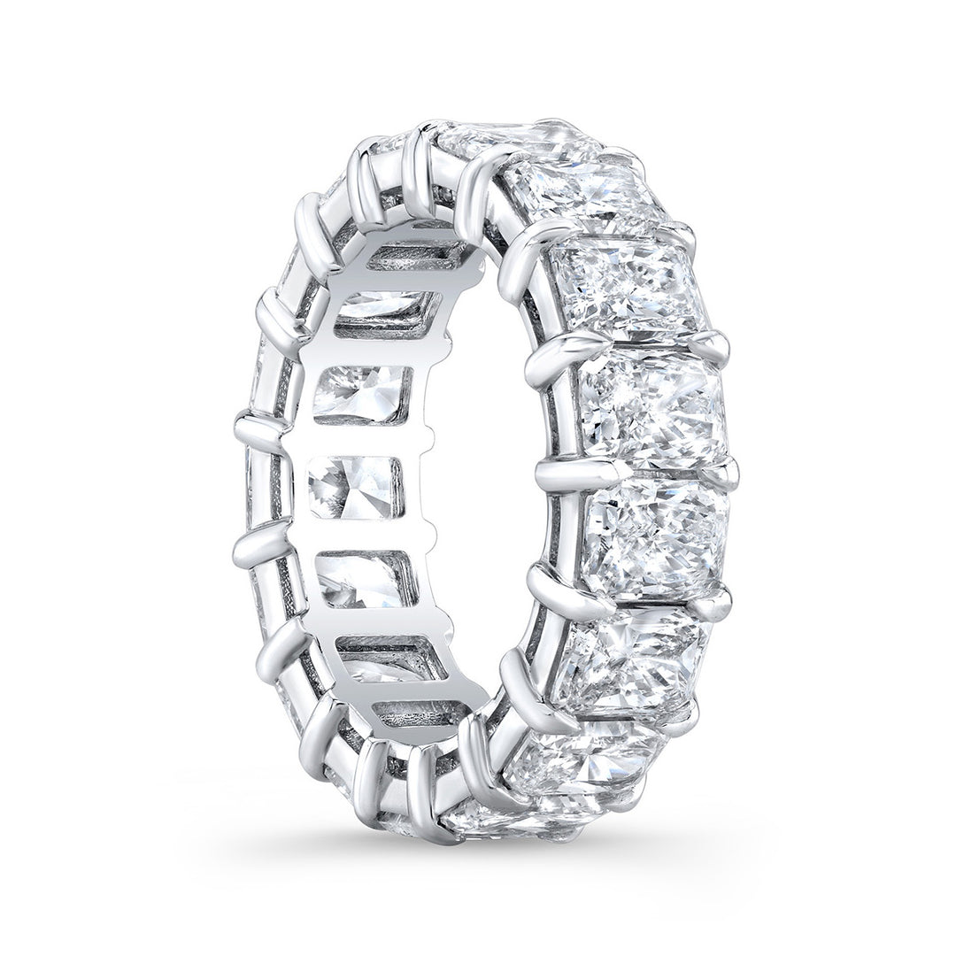Eternity band in platinum with shared basket claw prong set (14) radiant cut diamonds. D14.33ct.t.w. Size 6.25