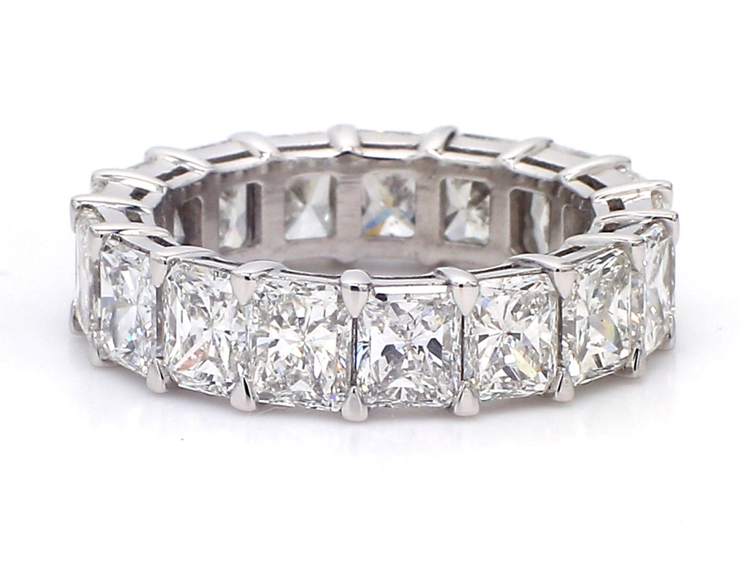 Eternity band in platinum with basket claw set D-G/VS2-SI1 (17) radiant cut diamonds. D7.00ct.t.w. Size 5.75