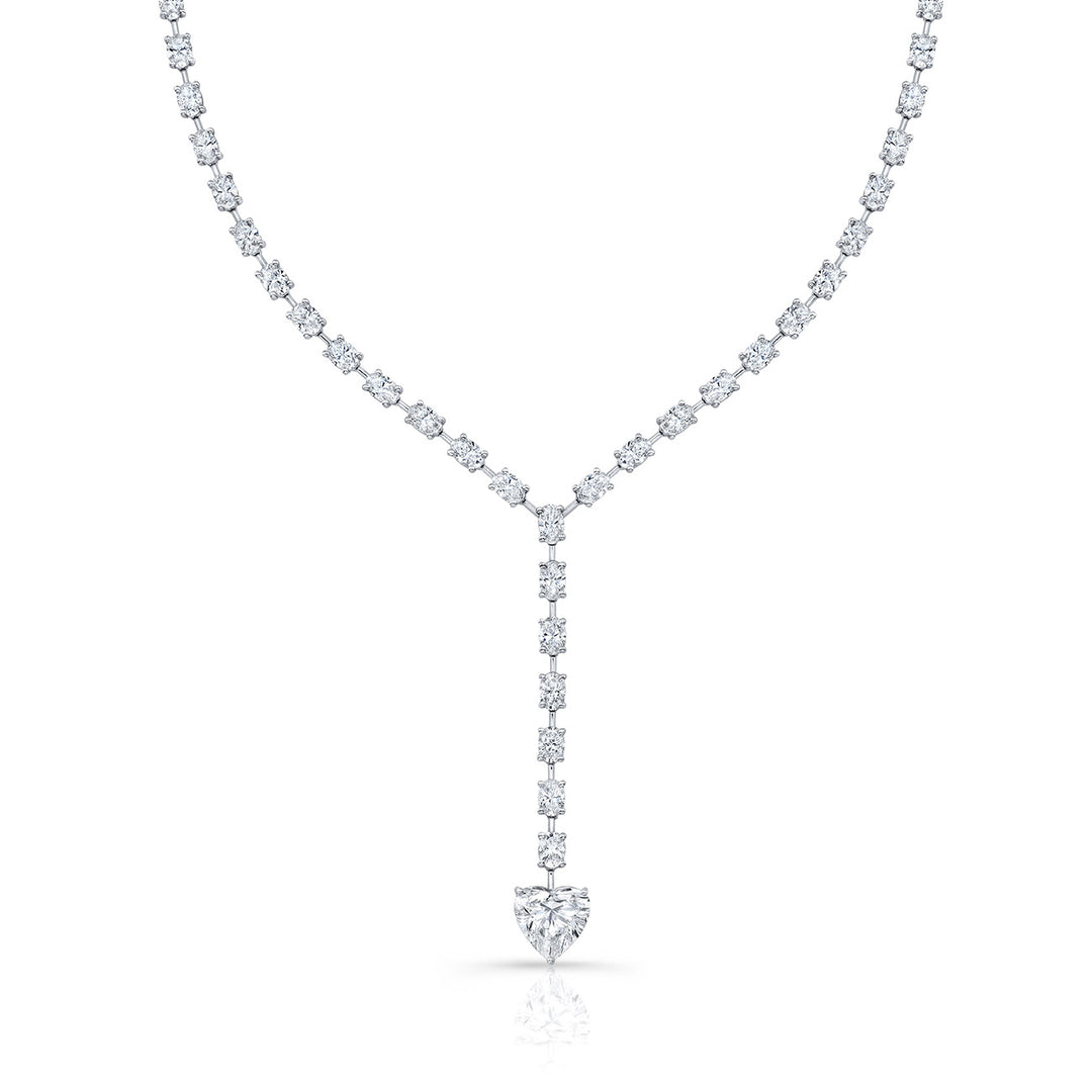 17"" Necklace in platinum with (70) oval cuts and USA certified G/SI3 heart shape diamond center. D16.86ct.t.w. (Center - 3.01ct.)