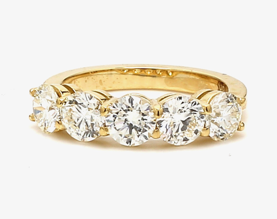5-stone band in 18K YG with basket prong set round diamonds. D2.47ct.t.w. Size 7