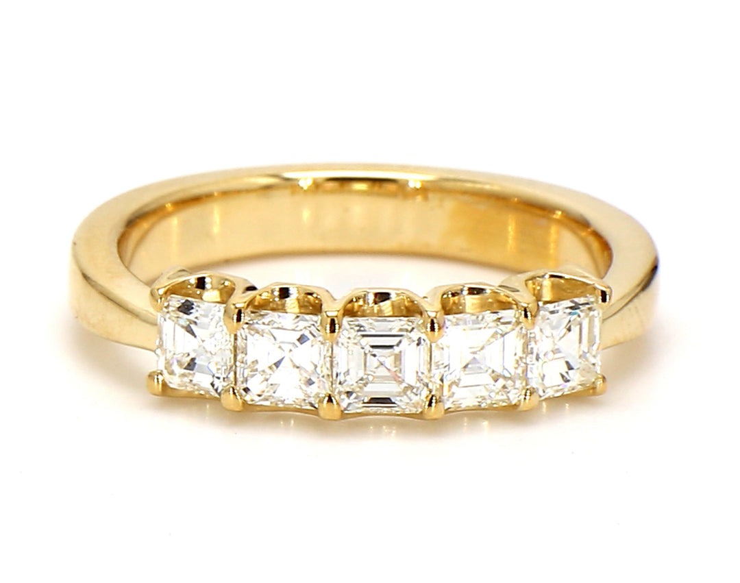 5-stone band in 18K YG with U-prong set asscher cut diamonds. D1.06ct.t.w. Size 7.5