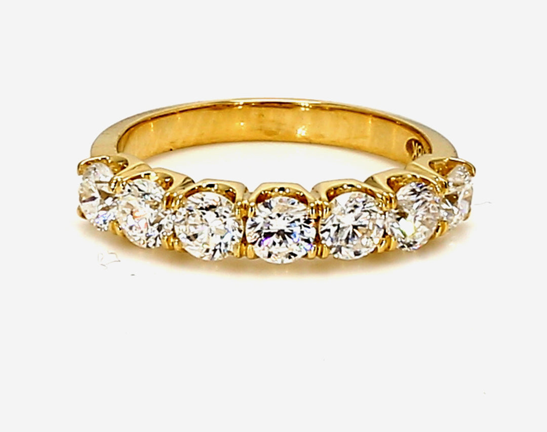 7-stone band in 18K YG with prong set round diamonds. D1.44ct.t.w. Size 6.5