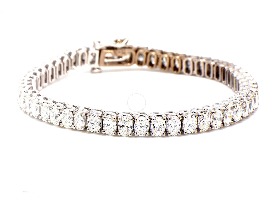 7"" Tennis bracelet with 4-prong set (51) oval cut diamonds. D11.16ct.t.w.