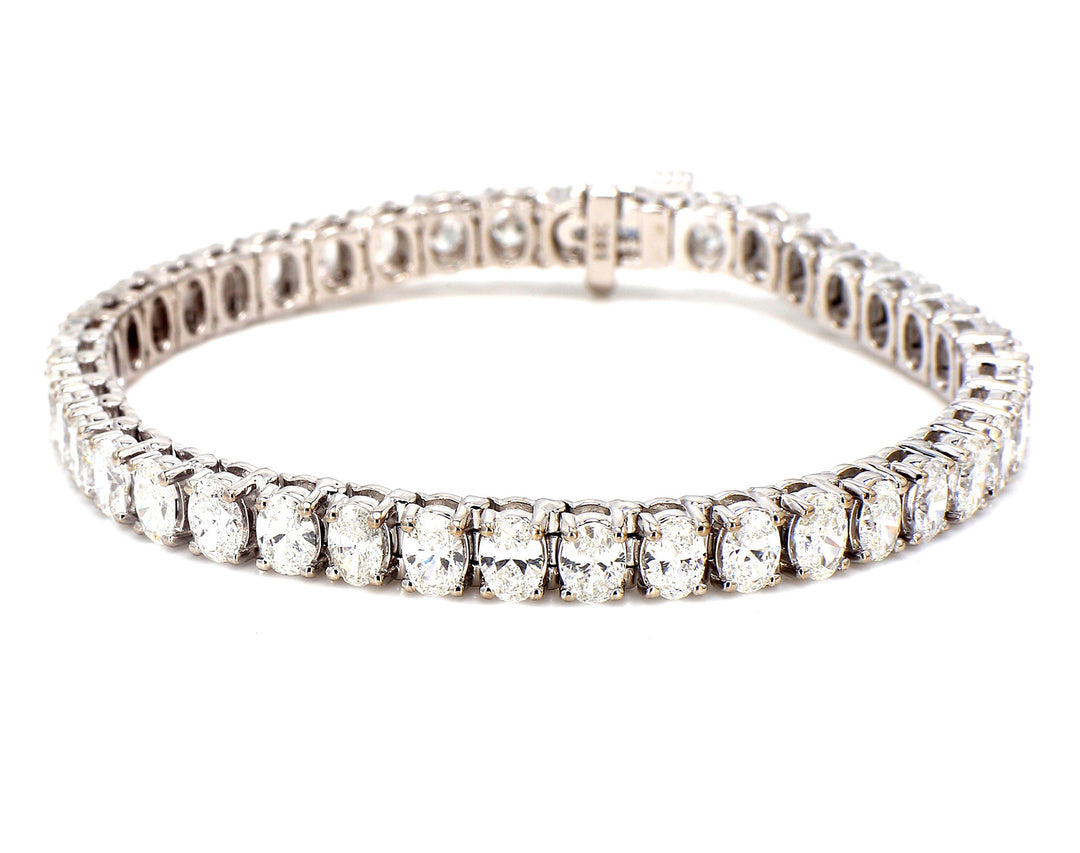 7"" Tennis bracelet in 18K WG with prong set (41) oval cut diamonds. D10.85ct.t.w.