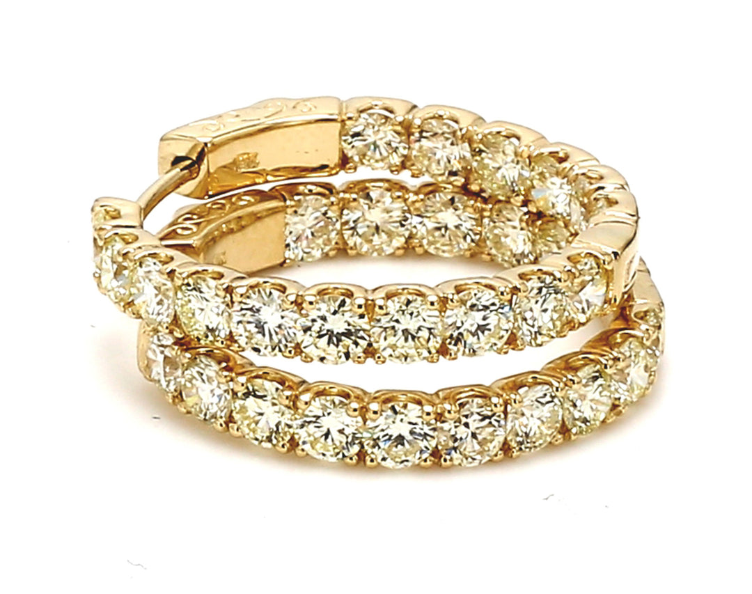 1"" Inside out hoop earrings in yellow gold with U-prong set (32) round diamonds. D3.68ct.t.w.