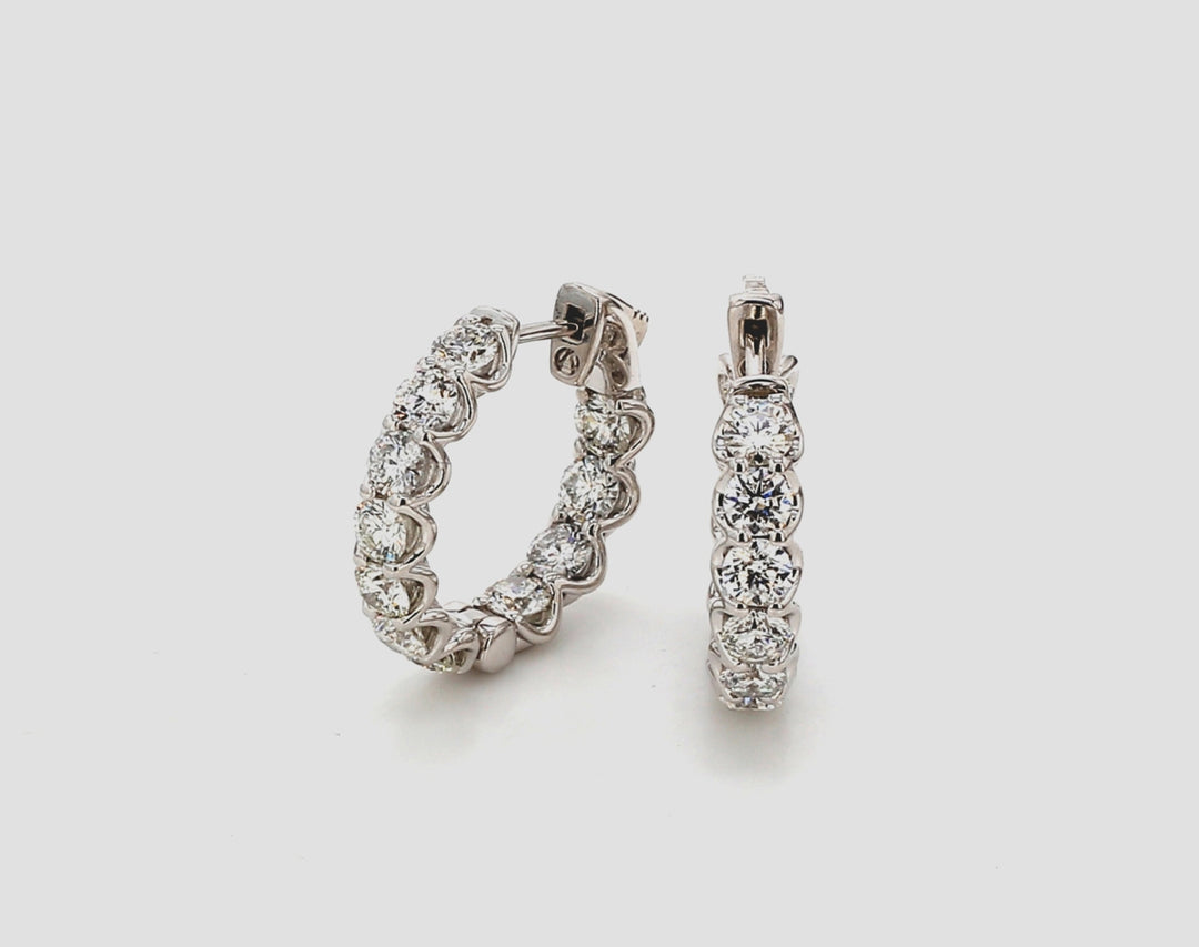 0.75"" Inside out hoop earring with U-prong set round diamonds. D3.67ct.t.w.
