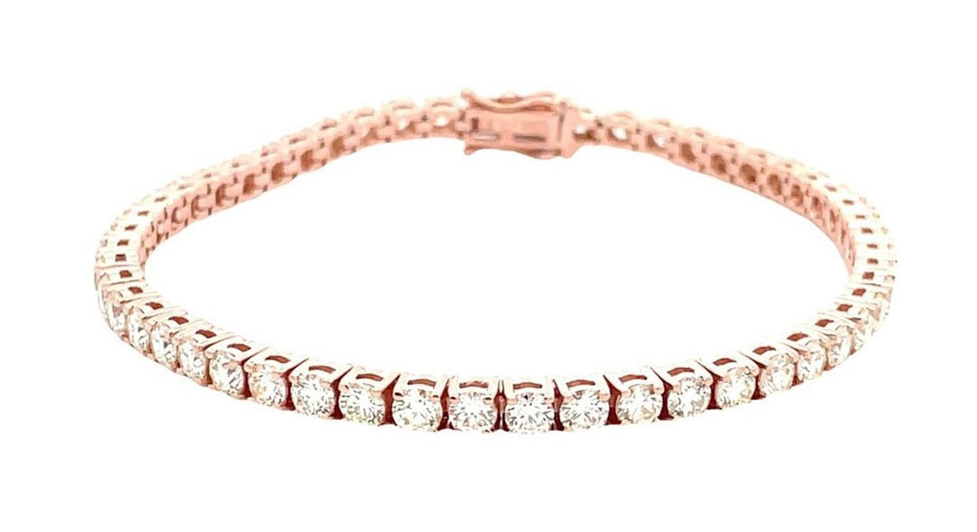 7"" Tennis bracelet in 14K RG with basket prong set (52) round diamonds. D6.61ct.t.w.