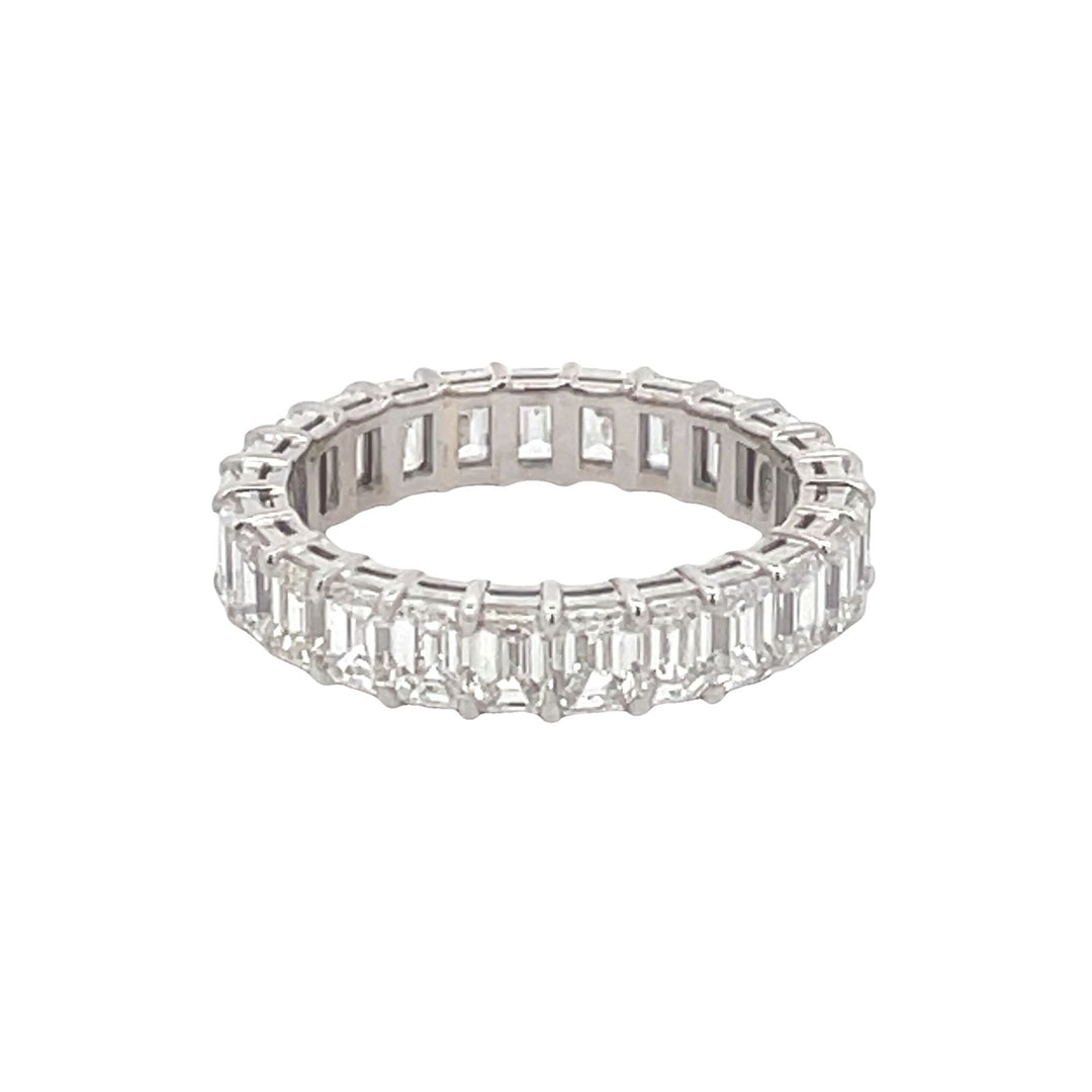 Eternity band in 18K WG with basket prong set (27) emerald cut diamonds. D2.41ct.t.w. Size 4.75