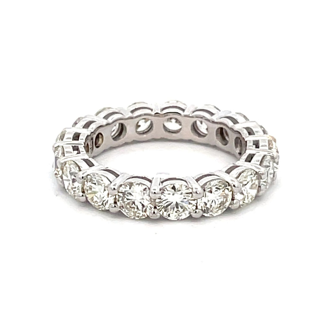 Eternity band in 18K WG with basket prong set (17) round diamonds. D4.21ct.t.w. Size 6.5