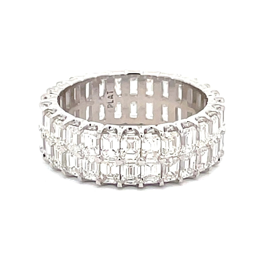 Two-row eternity band in platinum with U-prong set (56) emerald cut diamonds. D4.76ct.t.w. Size 6