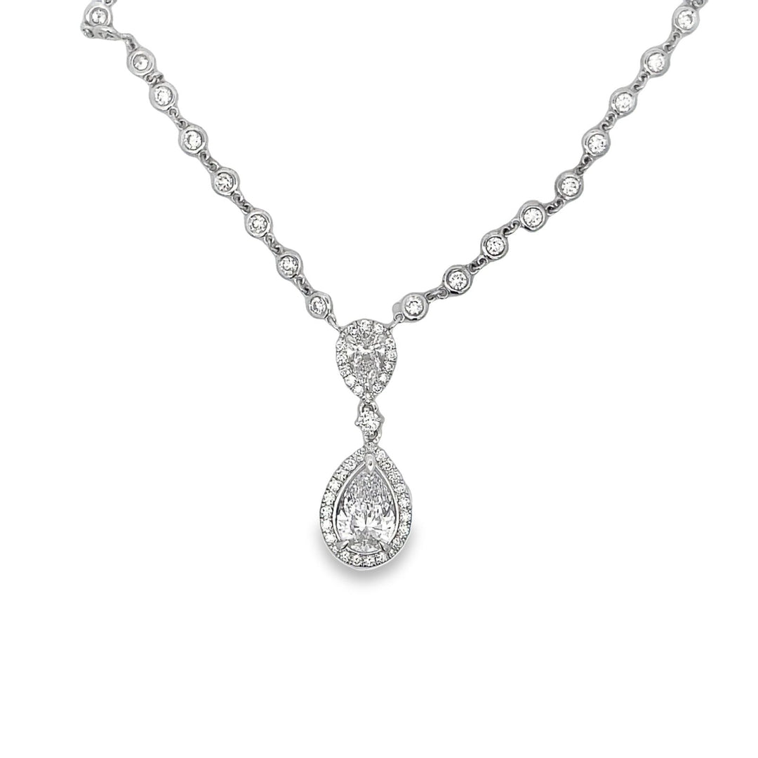 18"" Drop necklace in 18K WG with bezel set rounds, and halo set GIA certified D/SI1 and FY/SI1 pear shape diamonds. D7.42ct.t.w. (Center - 3.01ct.)