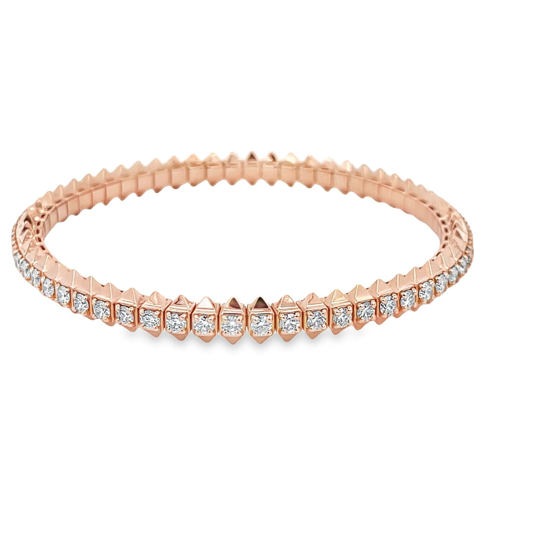 Flex tennis bangle in 18K RG with prong set (58) round diamonds. D3.30ct.t.w.